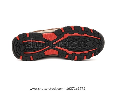 Outdoor walking and hiking shoe sole isolated on white background