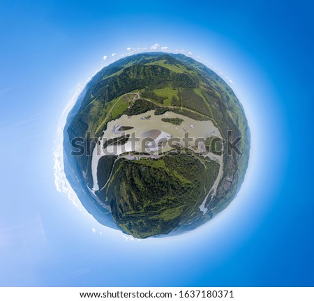 Aerial  panoramic view of planet earth above river Katun in the Altai mountains with green trees, Blue sky and clouds. Full VR 360 Degree Aerial Panorama Seamless Spherical.