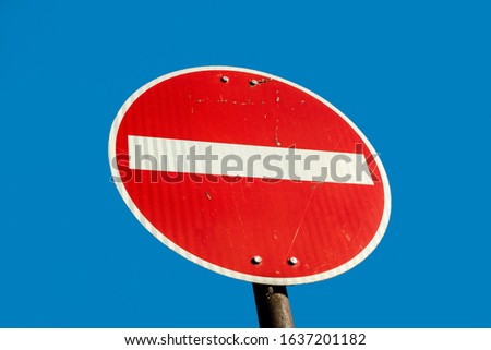 red traffic sign one way street  under blue sky