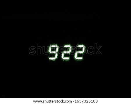 electronic numbers on a black background