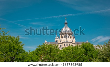 Almudena cathedral panoramic view from Las Vistillas park downtown Madrid, Spain on a warm sunny spring day