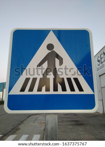pedestrian crossing sign on a street in Valencia