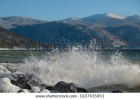 Russia. South Of Western Siberia, Altai Mountains. Splashes of autumn storm on the shore of the unsettled Teletskoye lake.