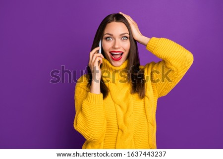 Photo of cheerful overjoyed ecstatic girlfriend talking on phone knowing news from her youngsters isolated vibrant color purple background