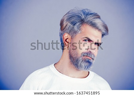 Confident and handsome man. Close up face of a young man without emotions. Closeup portrait of a confident middle eastern businessman