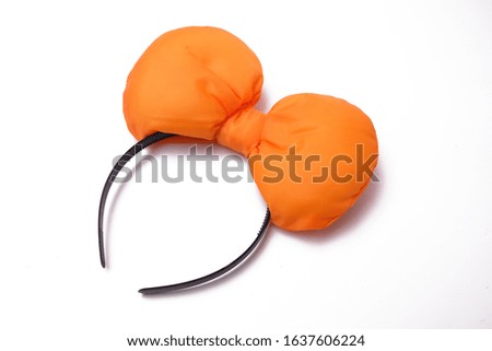 Orange headband isolated on white background.