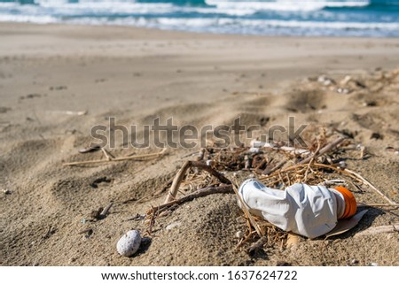 Plastic bottle waste on wild sea coast,damege nature ,planet save,cilento italy 