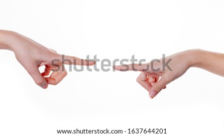 Woman's hands points a finger at something isolated on white background. Body language.