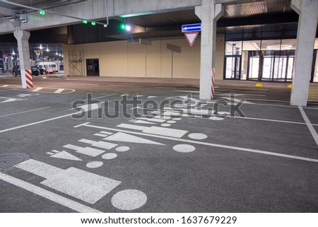 Car parking space reserved for family with baby. A special area dedicated to cars that bring the whole family.