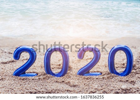 2020 on  clean beach with soft wave and white form , holiday vacation background, copy space