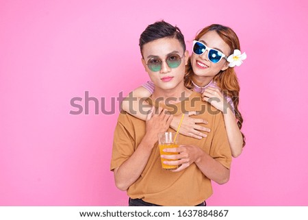 Asian young lovely cute couple with handsome guy and beautiful girl on pinky background