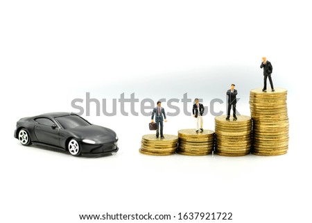 Miniature people : Businessman with money creditcard  and car Business consultants on financial transactions for car loan concept.