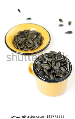Sunflower's seed in yellow mug