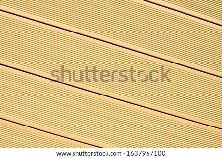 Vinyl siding texture, light beige color. Modern plastic wall cladding protective material for houses and small apartment buildings. Wood clapboard imitation