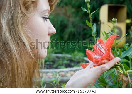 beautiful woman with orange hairs on nature