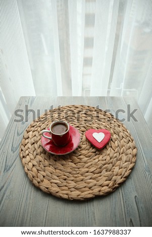 a cup of Turkish coffee and cookies specially prepared for Valentine's Day.