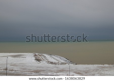 winter landscape sea shore in the snow