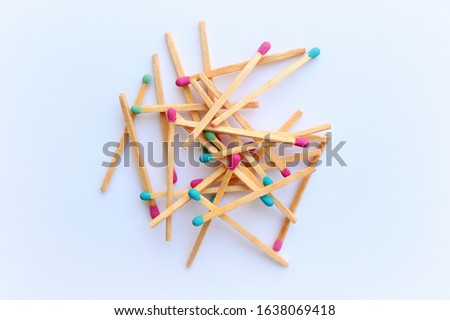 Bright colorful matches on a white background. Royalty-Free Stock Photo #1638069418