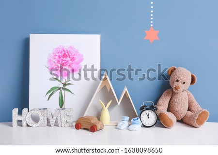 Baby accessories on table in room