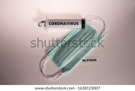 Protective face mask with a text shows recommended to use and coronavirus. 