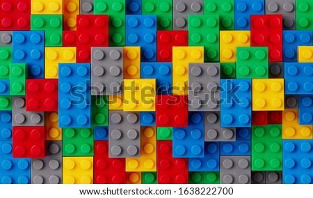 Multi-colored plastic blocks background closeup Royalty-Free Stock Photo #1638222700