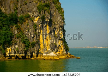 HA LONG, VIETNAM - 2015: Rock islands near floating village in Halong Bay, Southeast Asia
