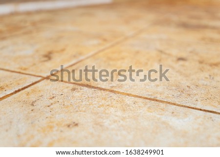 Closeup photo of dirty floor Royalty-Free Stock Photo #1638249901
