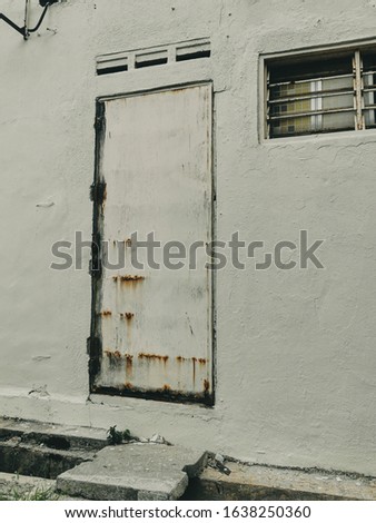 A picture of old shop door. 