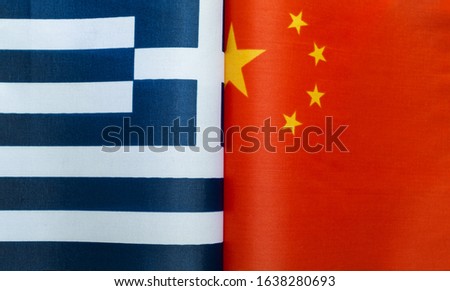 fragments of the national flags of the Greek Republic and China in close-up