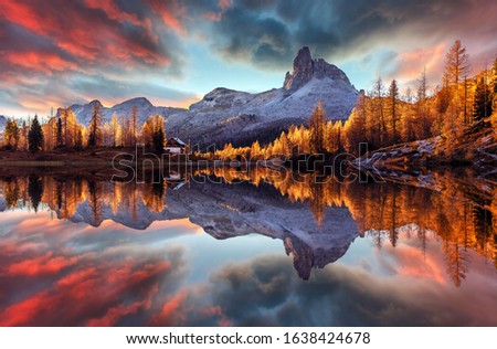 The beautiful nature landscape. Great view on Federa Lake early in the morning. The Federa lake with the Dolomites peak, Cortina D'Ampezzo, South Tyrol, Dolomites, Italy. popular travel locations.  Royalty-Free Stock Photo #1638424678