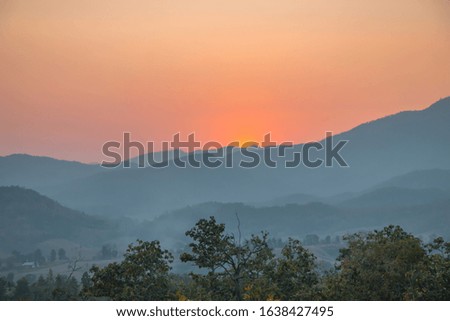 Beautiful view of the sunset over the mountains in northern Thailand