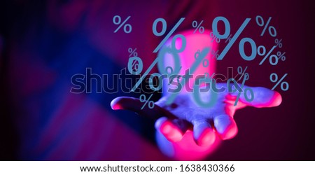 hand touches virtual percent icon