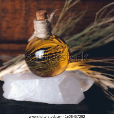 Essential Oil with flower and stone