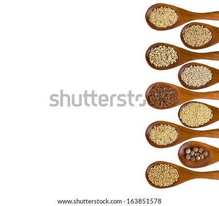 collection of grains in wooden spoon isolated on white background.
