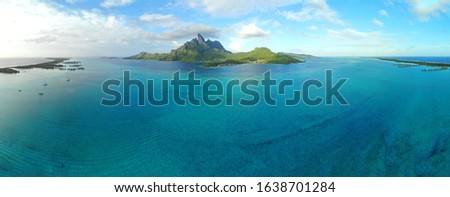 View of the Mont Otemanu mountain reflecting in water  in Bora Bora, French Polynesia, South Pacific Royalty-Free Stock Photo #1638701284