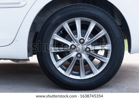 close up wheels white car, transportation concept