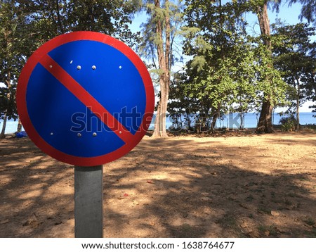 No parking sign on the beach road.