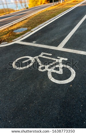 the symbol of a bicycle lane on the road