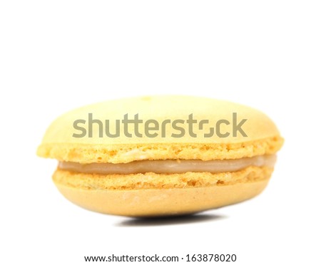 Yellow macaron cakes. Isolated on a white background.