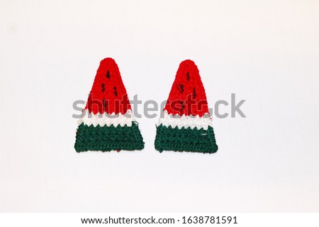 Two christmas hats on a white background