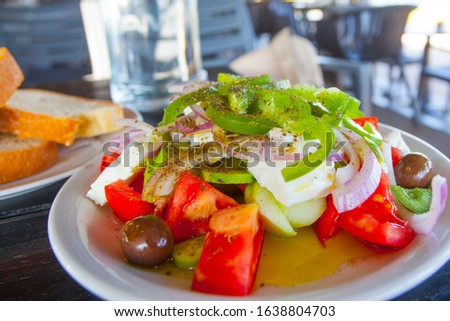 Fresh tasty greek salad in restaurant in Athens, Greece
