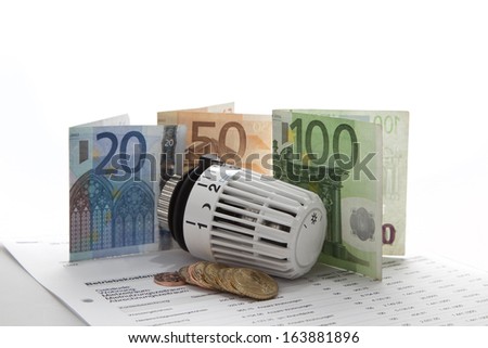 Heating concept with thermostat and banknotes