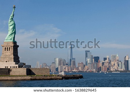 Statue of Liberty and Manhattan skyline.