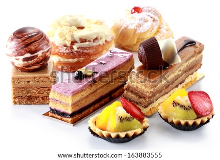 collection of various cakes on white background