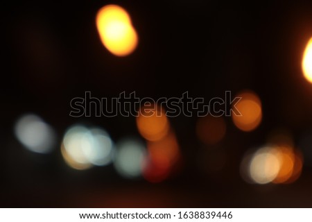 Blurred background of lights on the road when a car is moving at night in drunk mode
