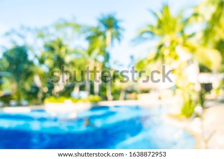 Abstract blur outdoor swimming pool in hotel resort for background