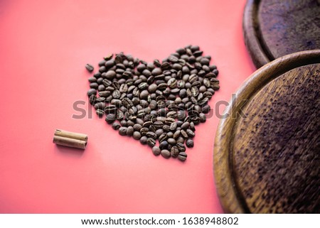 coffee beans in the form of a heart on a blackboard
