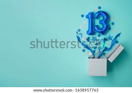 Number 13 birthday balloon celebration gift box lay flat explosion Royalty-Free Stock Photo #1638957763