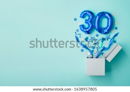 Number 30 birthday balloon celebration gift box lay flat explosion Royalty-Free Stock Photo #1638957805