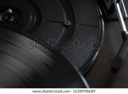 vinyl records close up photography. turntable with vinyl playing. record player 